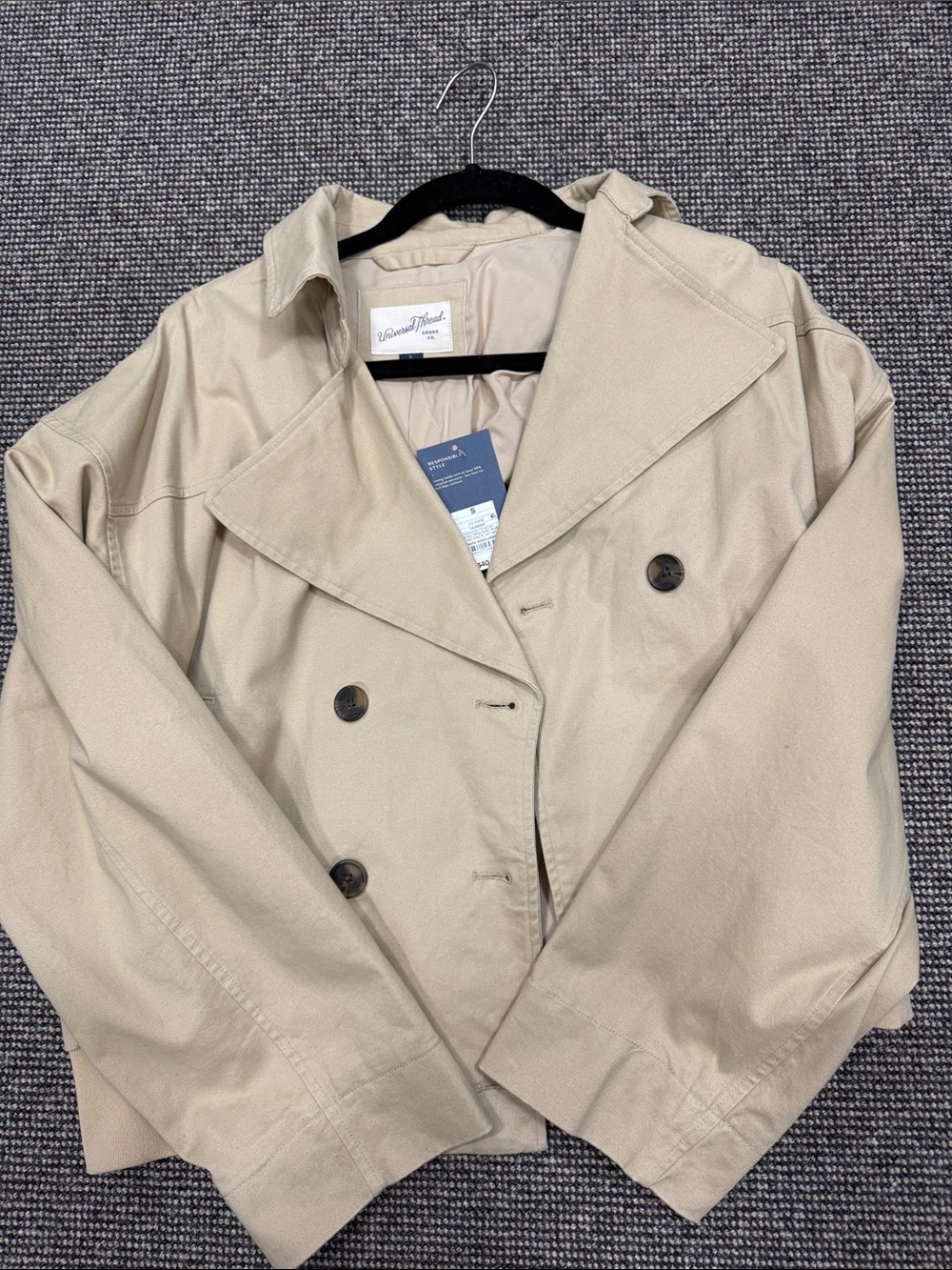 Cropped beige trench coat